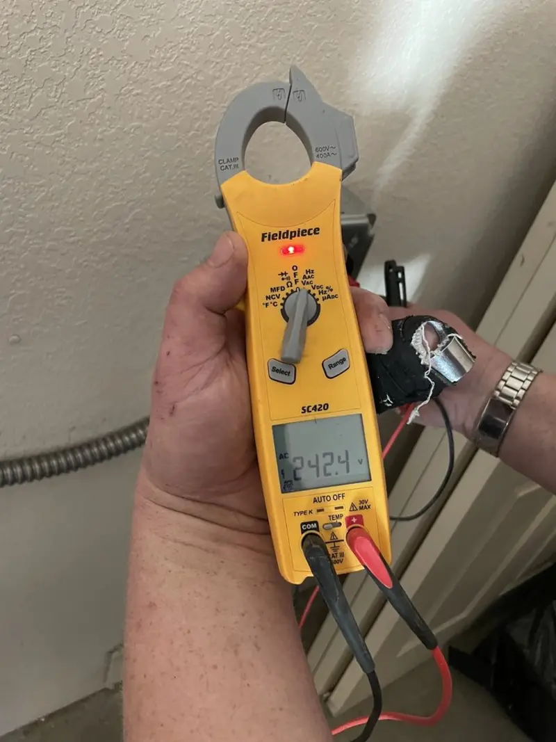 Voltage testing with clamp meter during Generator Installation in Bennettsville